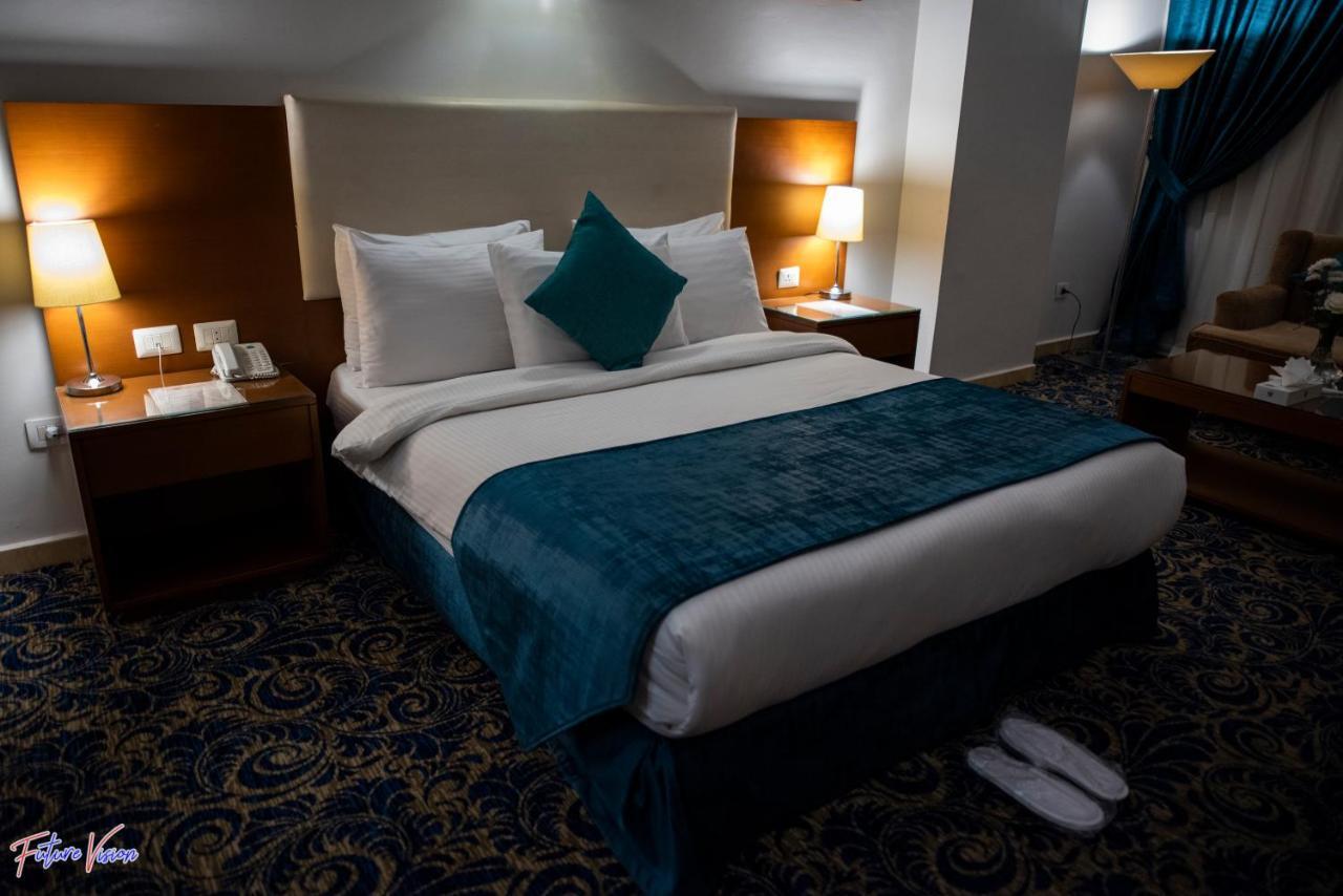 Rehana Plaza Hotel Cairo Exterior photo A bedroom at the hotel